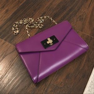 Gorgeous plum Kate Spade envelope style purse